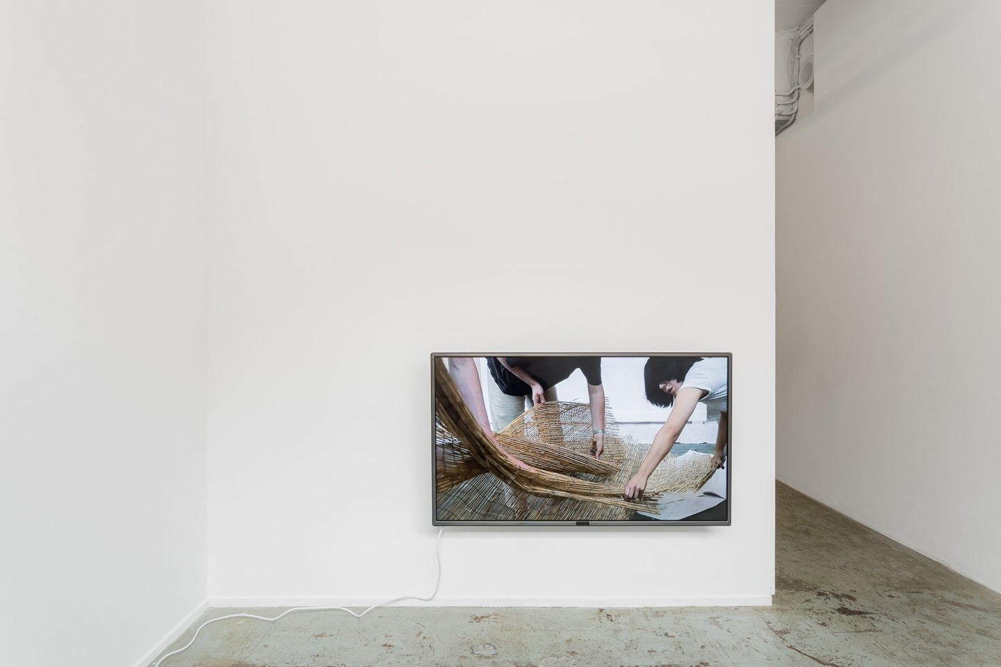<p><em>Talking to the back of your head</em>, 2018, single channel high definition digital video, 11:29, continuous loop. Installation view, Bus Projects, Narrm (Melbourne), 2018. Photography: Christo Crocker.</p>